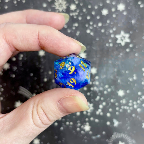 "Introspection" gold - Standard "nat nothing" logo d20