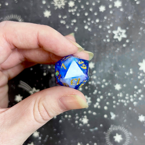 "Introspection" gold - Standard "nat nothing" logo d20